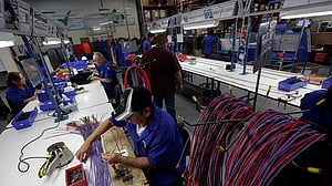 Canada records a big jump in trade deficit in November as exports fall