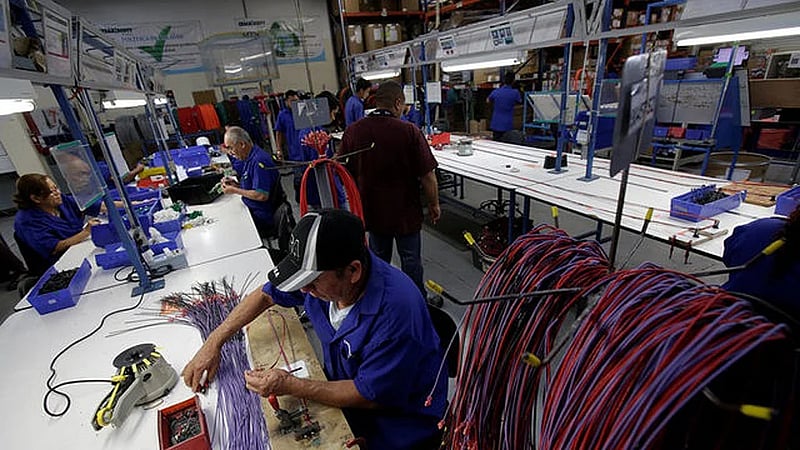 Canada records a big jump in trade deficit in November as exports fall