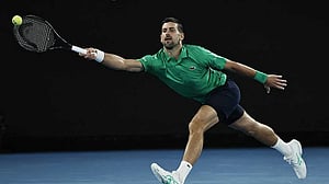 Milestone man Djokovic reaches Australian Open fourth round
