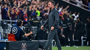 Flick braced for Racing test after Barca's Super Cup glory
