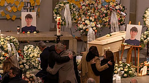 Teen football player who died in Swiss bar fire laid to rest