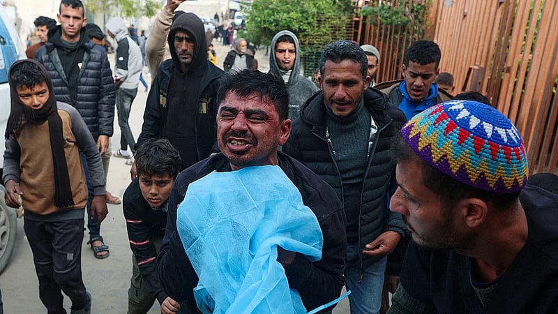 Israeli fire kills 11, including journalists and children, Gaza medics say