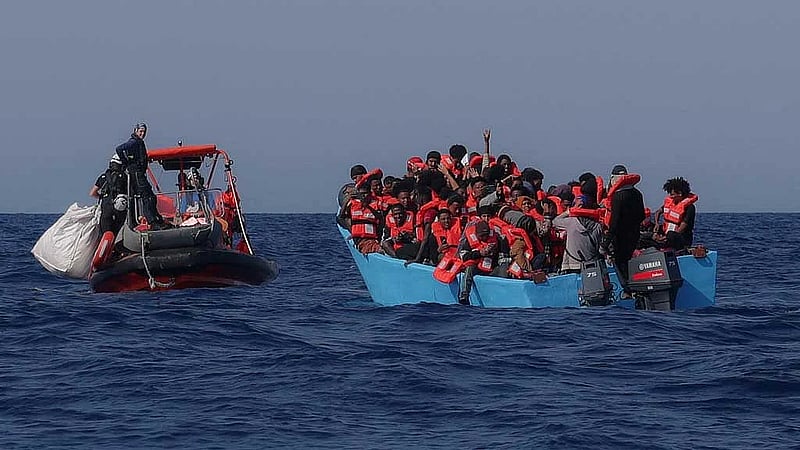 Libya's security authorities free more than 200 migrants from 'secret prison', two security sources say