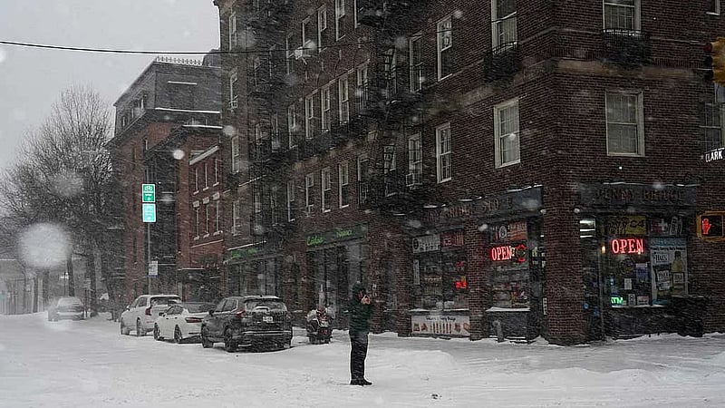 Millions of Americans, digging out after deadly snowstorm, face days of bitter cold