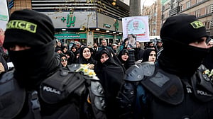 Iran deaths went beyond protesters, hitting bystanders too, witnesses say