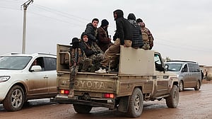 Syrian troops clash with Kurdish forces after dispute over withdrawal deal