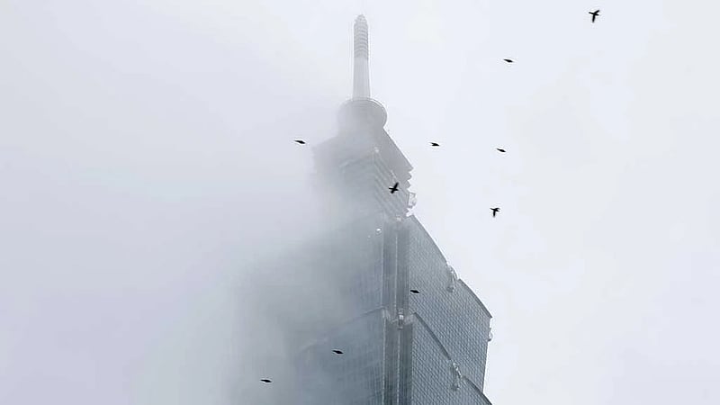 'Free solo' climb of Taiwan's tallest building postponed due to weather