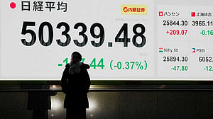 Asia shares near record high on AI optimism, dollar up on receding Fed cut bets