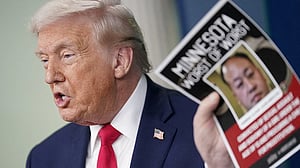 Mugshots, binder clip and Hells Angels feature in Trump's one-year anniversary remarks