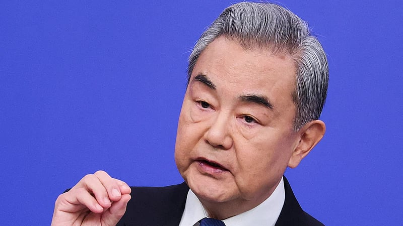 China's foreign minister urges early peace talks in call with Iranian counterpart
