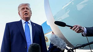 Trump says ICE agents should not wear masks at airports