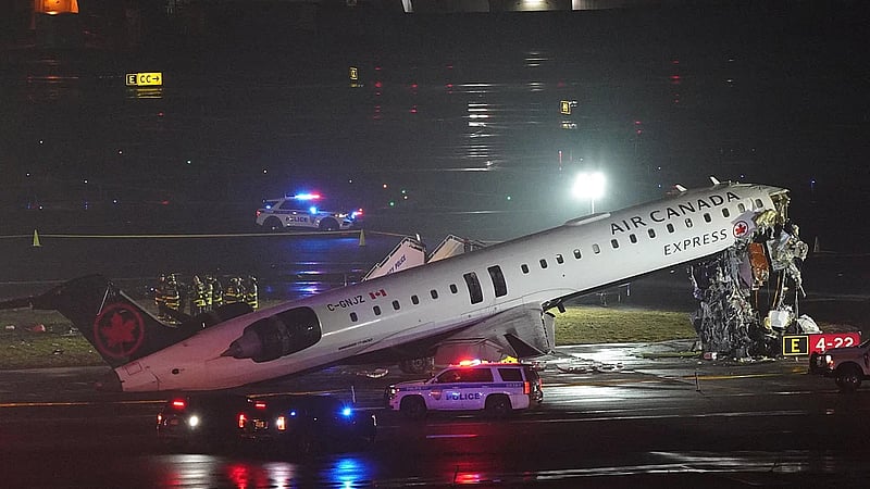 Passenger jet collides with fire truck in New York's LaGuardia, killing both pilots