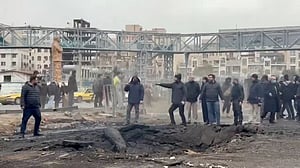 Air strikes reported across the Middle East, Iran clamps down on dissent