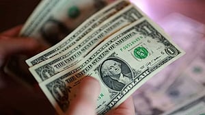Dollar hangs near six-week lows as investors bet on Iran peace deal