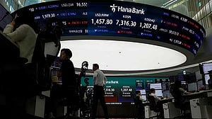 Asia markets hit records on AI euphoria, Iran peace hopes