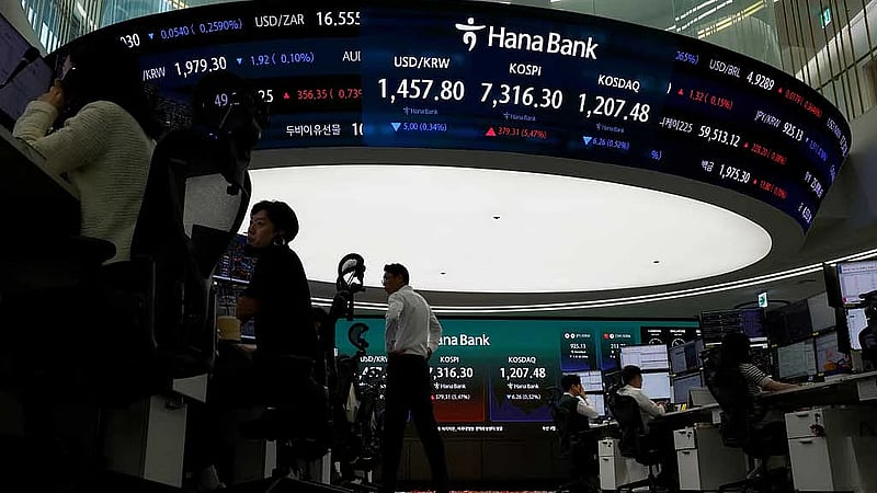 Asia markets hit records on AI euphoria, Iran peace hopes