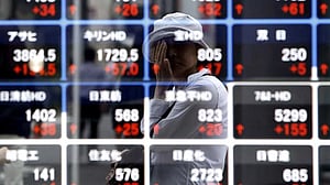 Asian shares climb, oil holds gains as markets eye Iran talks, central bank moves