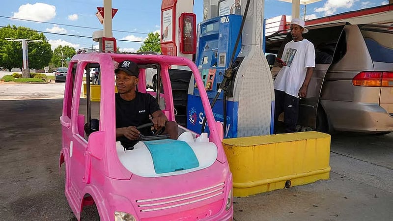 High gas prices spur Americans to improvise, from bus rides to toy cars