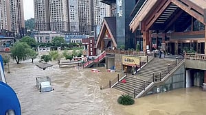 At least 21 killed as heavy rains drench southern, central China