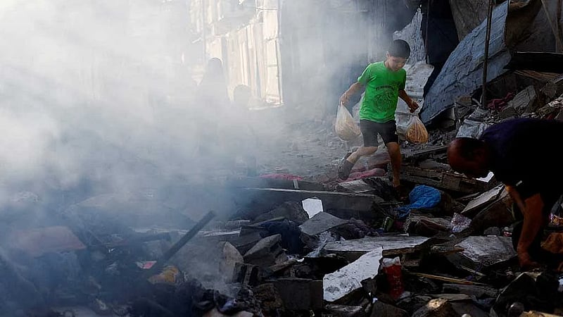 Israeli fire kills parents and their infant in Gaza, medics say