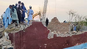 Car bombing and shootout kills 14 Pakistani police officers