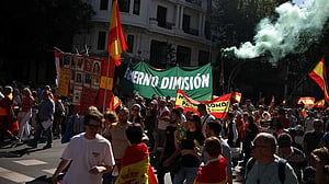 Tens of thousands march in Madrid to demand prime minister's resignation