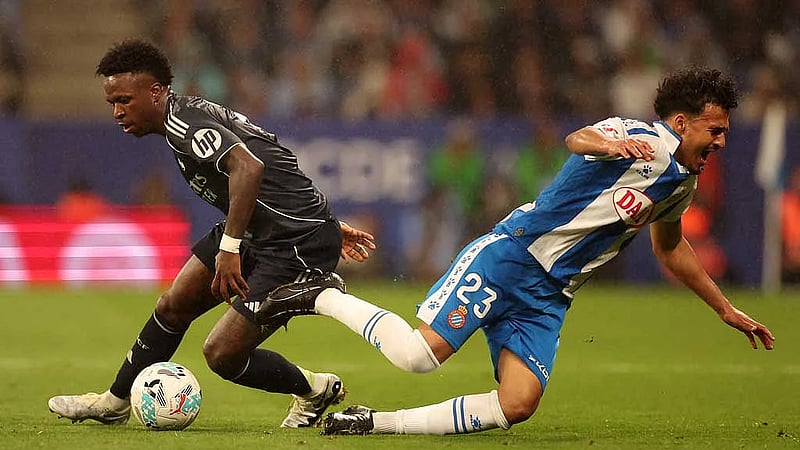 Vinicius double keeps Real's faint LaLiga hopes alive