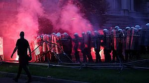 Police and protesters clash in Serbia as crowds demand president's exit