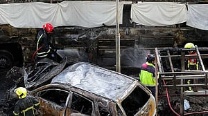 At least eight dead, 25 injured in train collision that sparks bus fire in Thailand