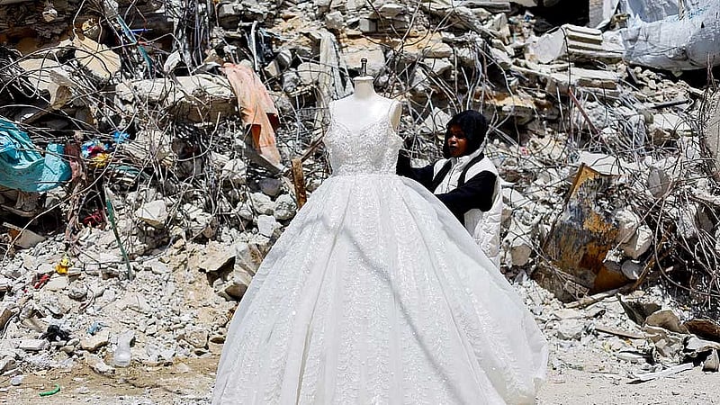 In war‑scarred Gaza, brides turn to refurbished wedding dresses