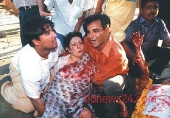 Blood-soaked Ivy Rahman after the Aug 21, 2004 grenade attacks.