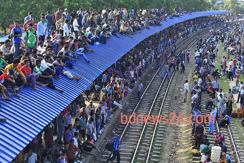 Airport Railway Station in Dhaka is crammed with homebound people ahead of Eid-ul-Azha on Monday.