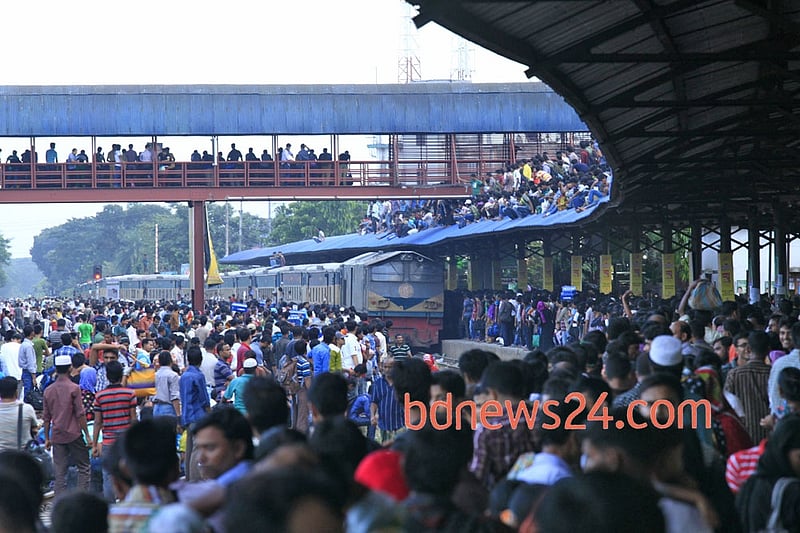 Airport Railway Station in Dhaka is crammed with homebound people ahead of Eid-ul-Azha on Monday.