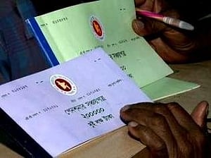 Govt cutting savings certificates interest rates to ease debt burden