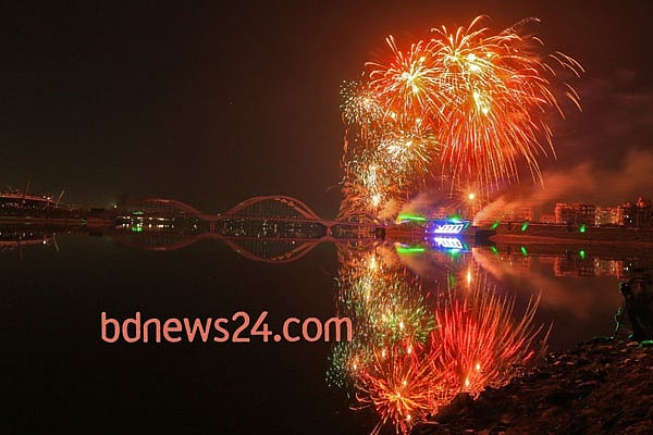 Fireworks light up the night sky during a festival of lights at Hatirjheel in Dhaka to celebrate attainement of 10,000 megawatt power generation capacity.