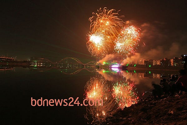 Fireworks light up the night sky during a festival of lights at Hatirjheel in Dhaka to celebrate attainement of 10,000 megawatt power generation capacity.