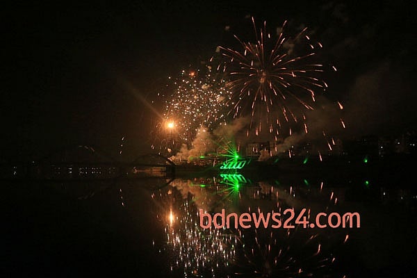 Fireworks light up the night sky during a festival of lights at Hatirjheel in Dhaka to celebrate attainement of 10,000 megawatt power generation capacity.