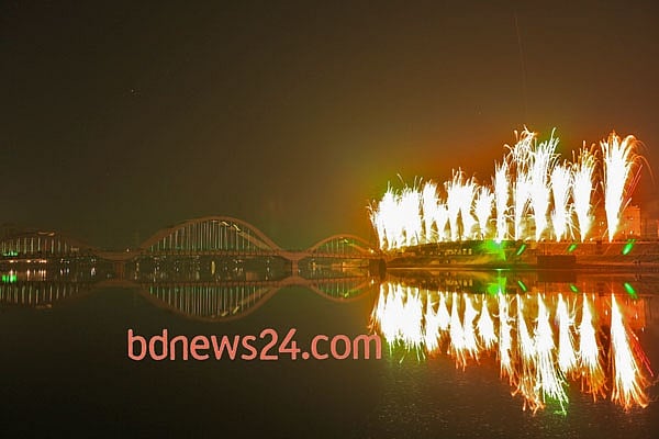 Fireworks light up the night sky during a festival of lights at Hatirjheel in Dhaka to celebrate attainement of 10,000 megawatt power generation capacity.