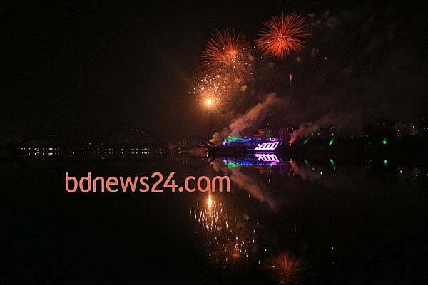 Fireworks light up the night sky during a festival of lights at Hatirjheel in Dhaka to celebrate attainement of 10,000 megawatt power generation capacity.