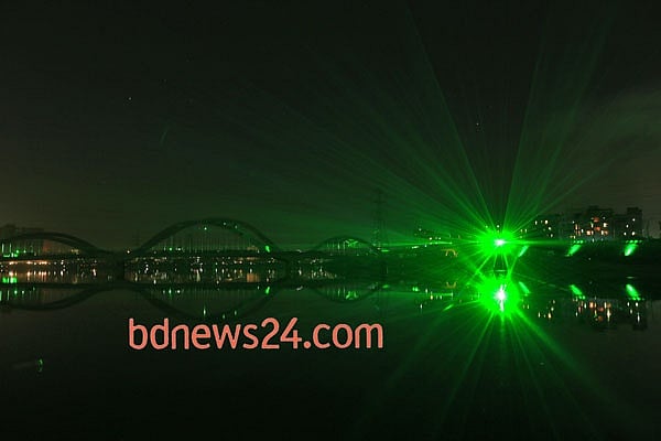 Laser show on the night sky of Hatirjheel in Dhaka during a festival of lights to celebrate reaching 10,000 megawatt power generation capacity.