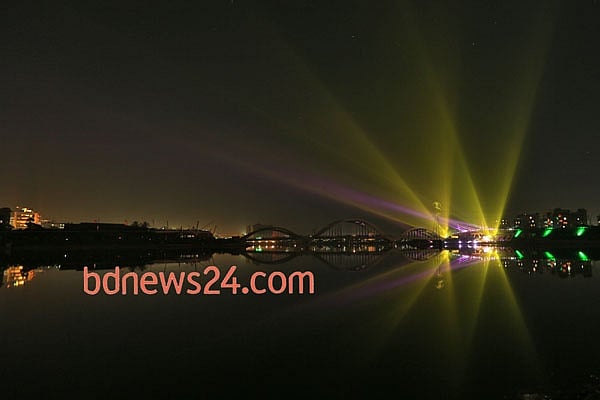 Laser show on the night sky of Hatirjheel in Dhaka during a festival of lights to celebrate reaching 10,000 megawatt power generation capacity.