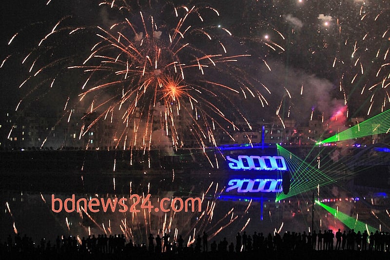 Fireworks light up the night sky during a festival of lights at Hatirjheel in Dhaka to celebrate attainement of 10,000 megawatt power generation capacity. Photo: asaduzzaman pramanik