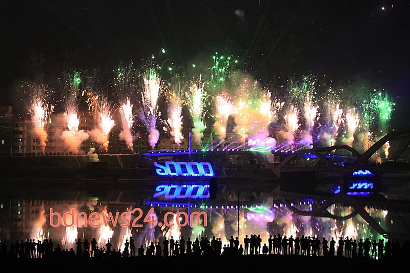 Fireworks light up the night sky during a festival of lights at Hatirjheel in Dhaka to celebrate attainement of 10,000 megawatt power generation capacity. Photo: asaduzzaman pramanik