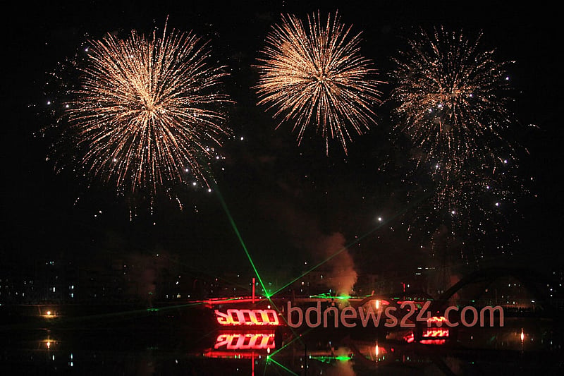 Fireworks light up the night sky during a festival of lights at Hatirjheel in Dhaka to celebrate attainement of 10,000 megawatt power generation capacity. Photo: asaduzzaman pramanik