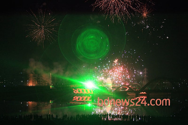 Laser show on the night sky of Hatirjheel in Dhaka during a festival of lights to celebrate reaching 10,000 megawatt power generation capacity. Photo: asaduzzaman pramanik