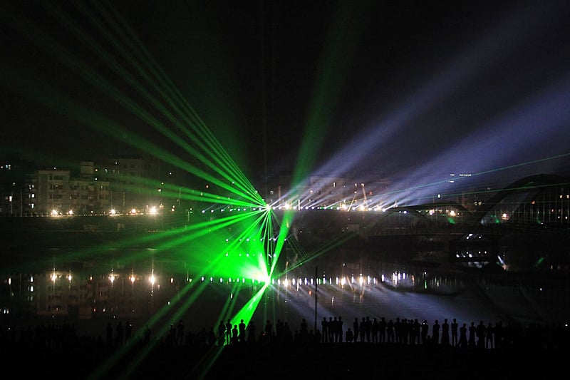 Laser show on the night sky of Hatirjheel in Dhaka during a festival of lights to celebrate reaching 10,000 megawatt power generation capacity. Photo: asaduzzaman pramanik