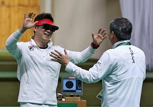 Korea's Jin makes history with third straight gold