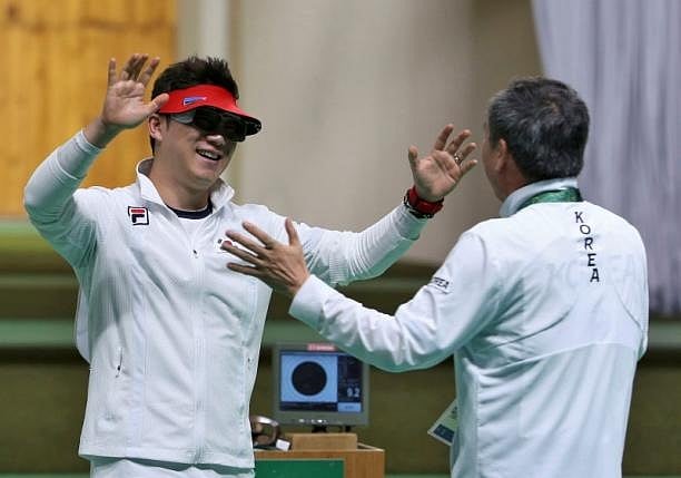 Korea's Jin makes history with third straight gold