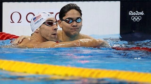 Schooling makes life harder for Phelps