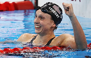 Ledecky smashes 800m record to claim freestyle treble